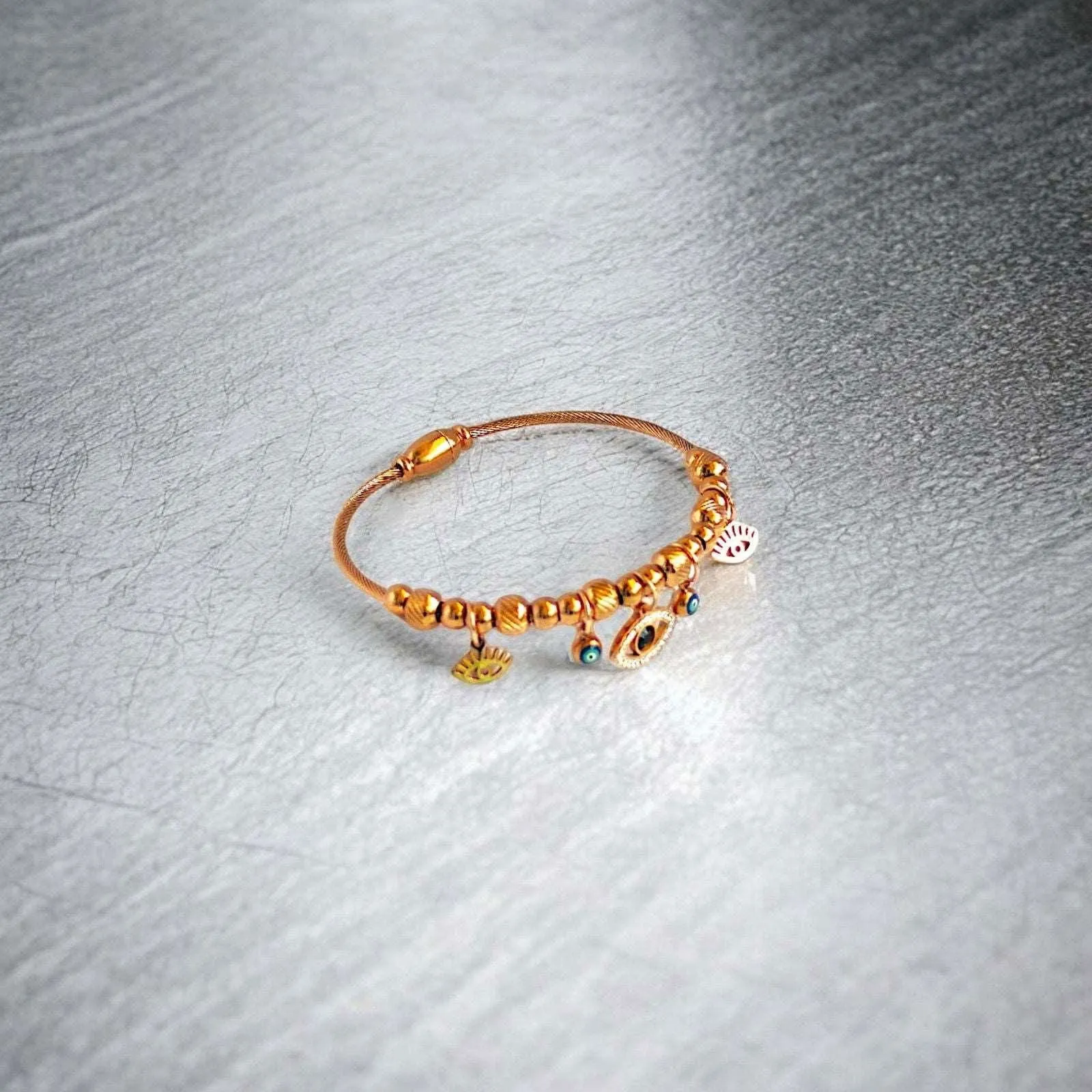 Rose Gold Evil Eye Sunburst Charms Bracelet