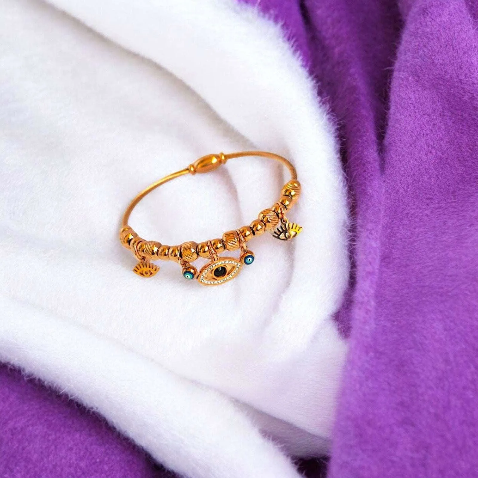 Rose Gold Evil Eye Sunburst Charms Bracelet
